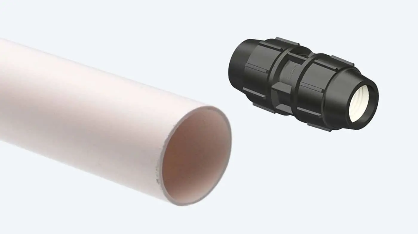 White PVC pipe and black plastic compression fitting connector shown against white background.