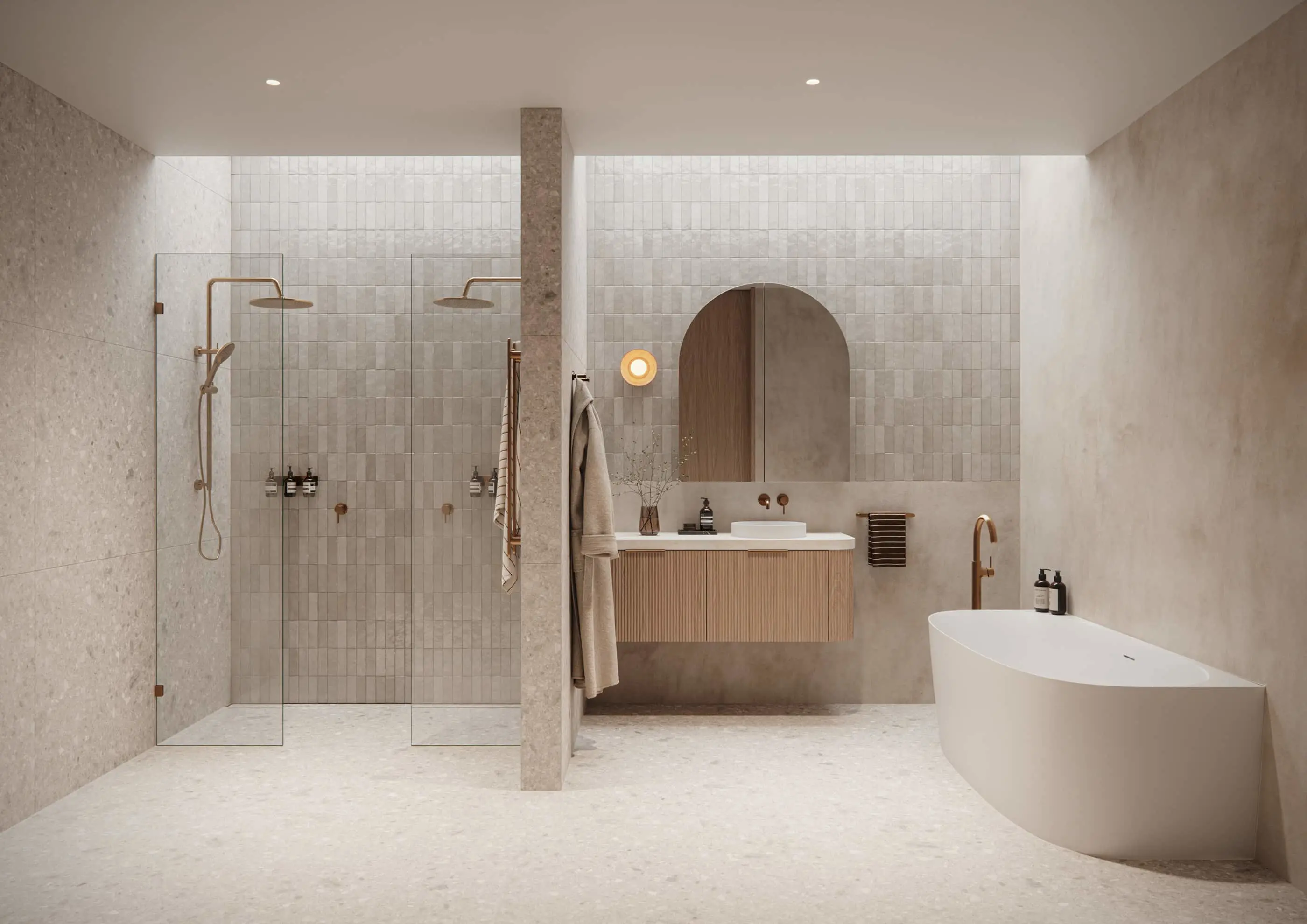 Modern minimalist bathroom with beige tiled walls, glass shower enclosure, floating wooden vanity, and freestanding white bathtub.