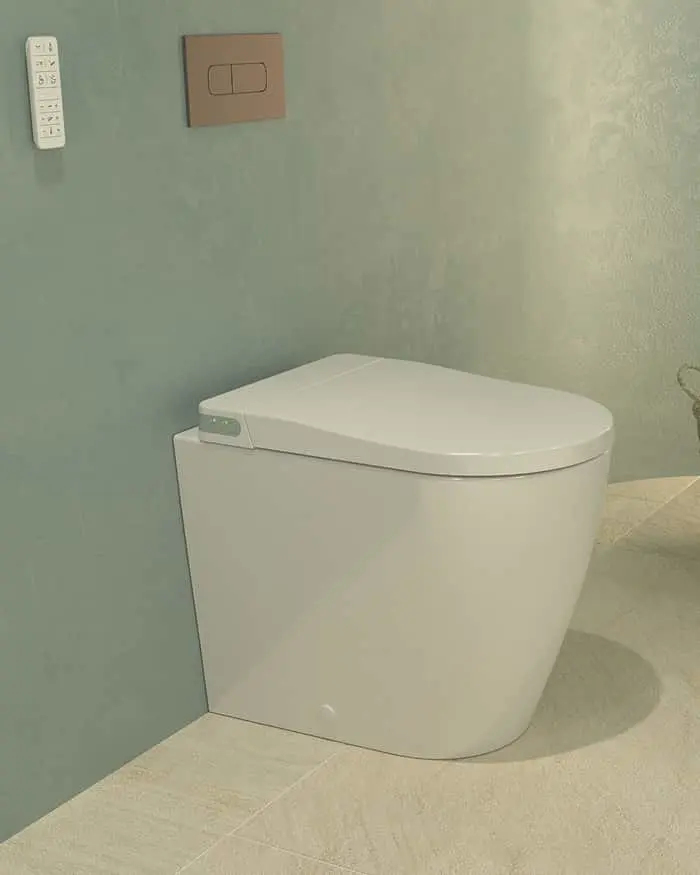 White modern smart toilet against a light green wall with a beige flush panel and wall-mounted control panel.