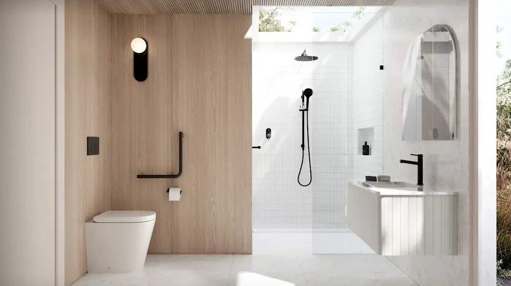 Modern bathroom with wood paneling, white toilet, glass shower enclosure, and skylight bringing natural light.