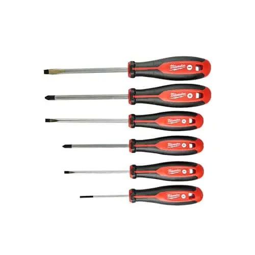 Set of six Milwaukee screwdrivers with red and black ergonomic handles arranged in a row.