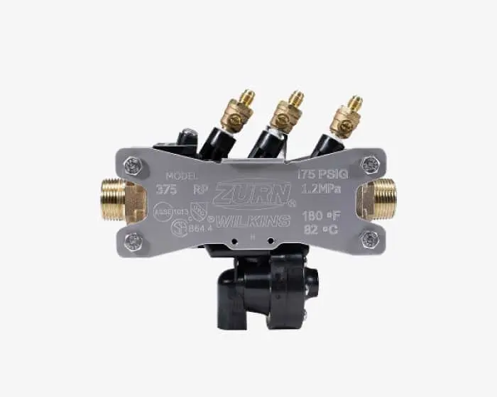 Zurn Wilkins Model 375 plumbing valve with brass fittings, black connectors, and pressure specifications on gray body.