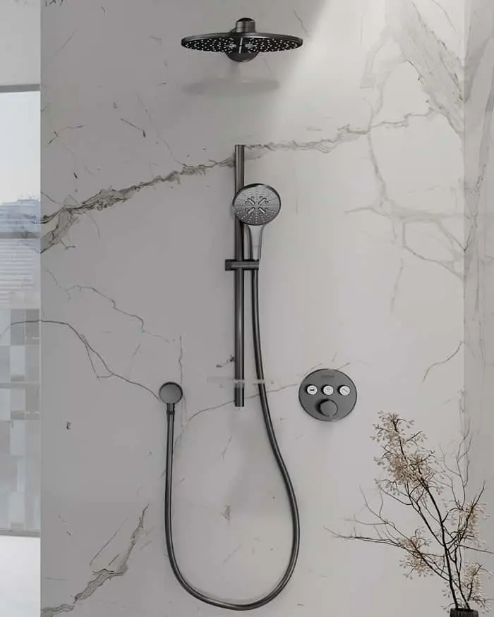 Modern shower system with rainfall showerhead and handheld sprayer mounted on white marble walls.