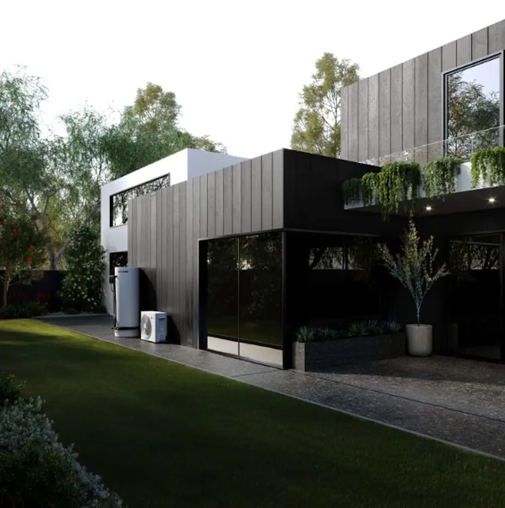 Modern house with gray and black exterior, large windows, hanging plants on balcony, and neat lawn in foreground.