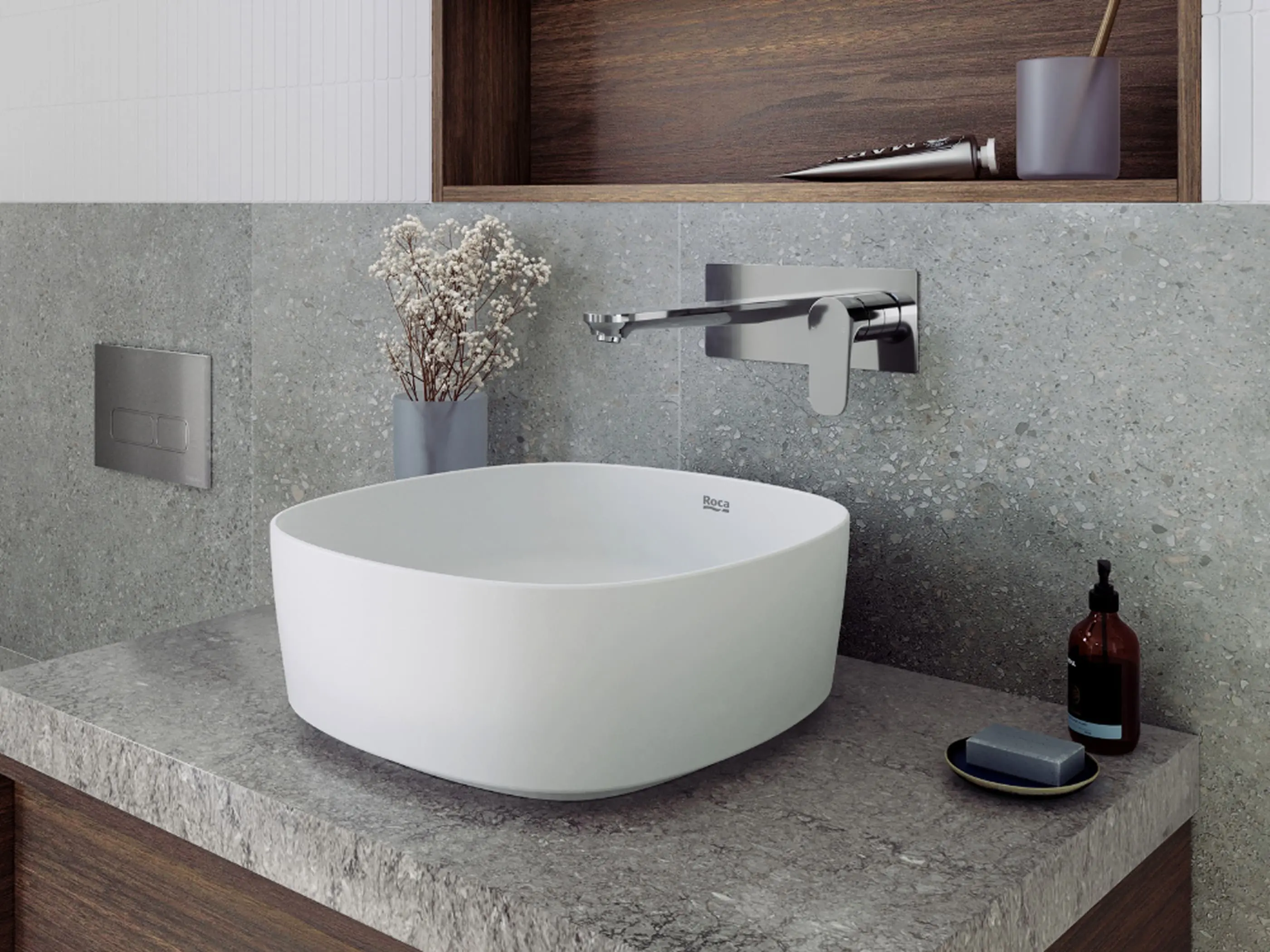 Modern bathroom with white vessel sink, wall-mounted chrome faucet, gray stone countertop, and minimalist decor.