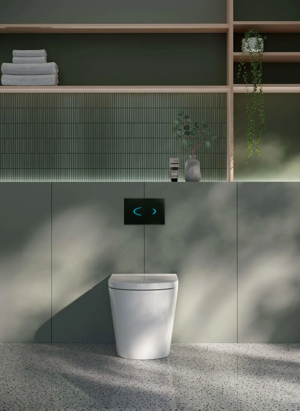 Modern bathroom with white toilet, green tiled wall, wooden shelving with folded towels and hanging plant.