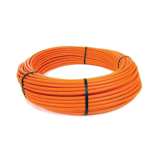 Coiled orange conduit pipe secured with black ties on white background.