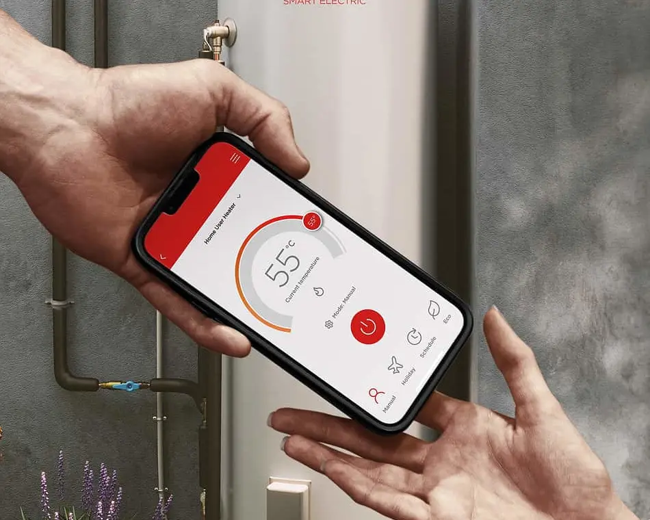 Hand controlling Thermann Smart Electric water heater with smartphone app showing 55°C temperature setting.