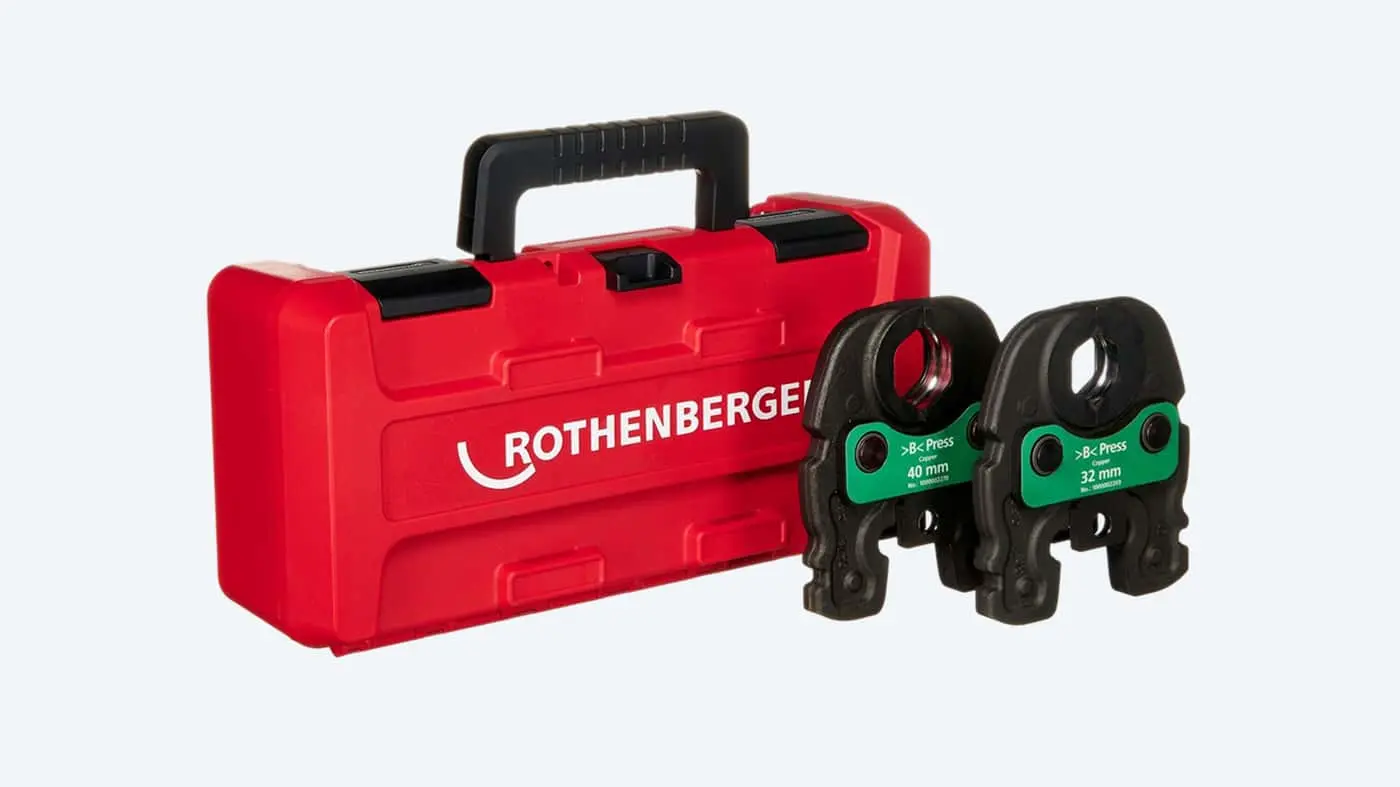 Red Rothenberger tool case with two black and green press fittings marked 32mm and 40mm.