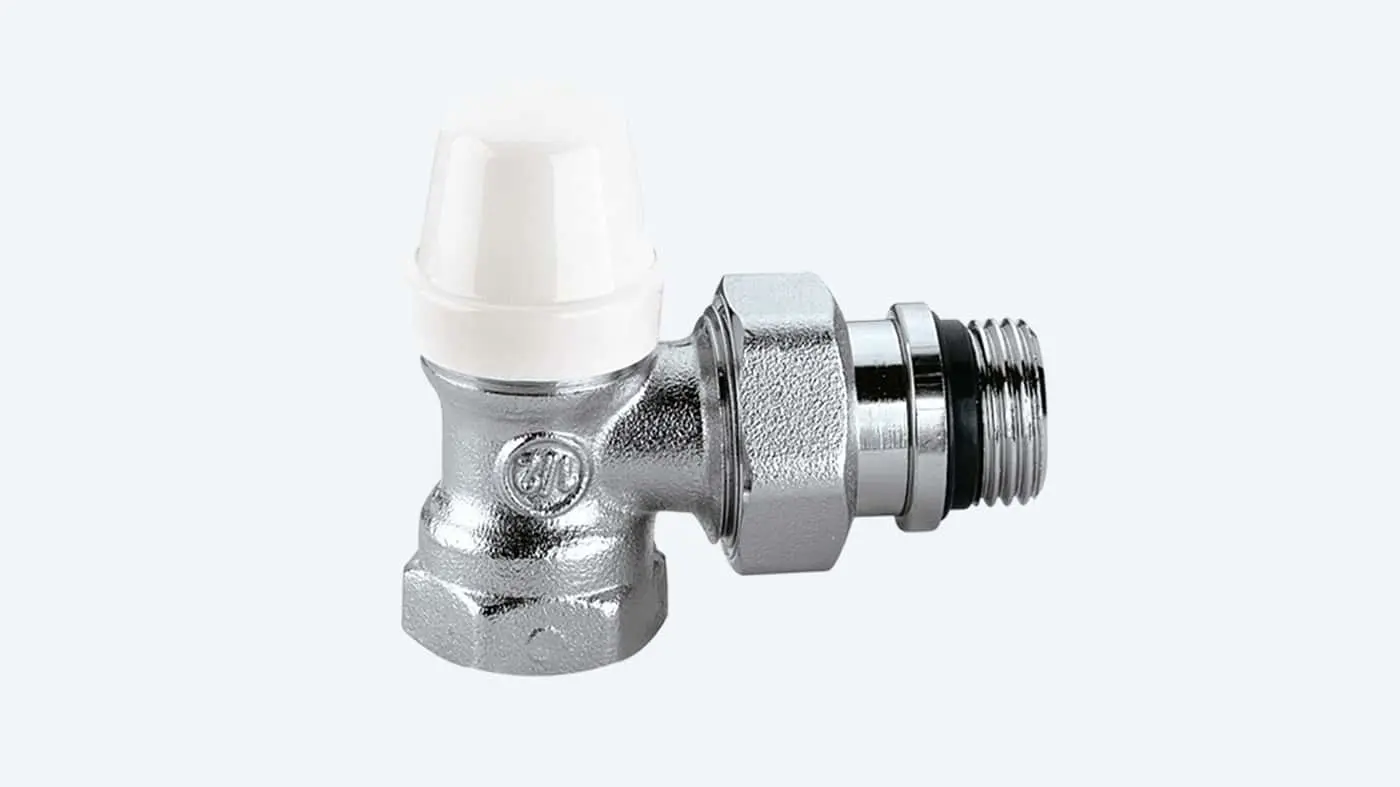 Angled radiator valve with white control knob and chrome metal body against white background.