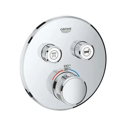 Circular chrome GROHE shower control panel with temperature dial and two function buttons on a white background.