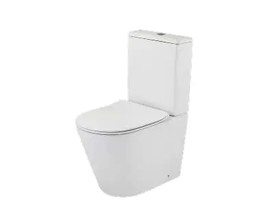 Modern white ceramic toilet with sleek design, closed lid, and floor-mounted tank.