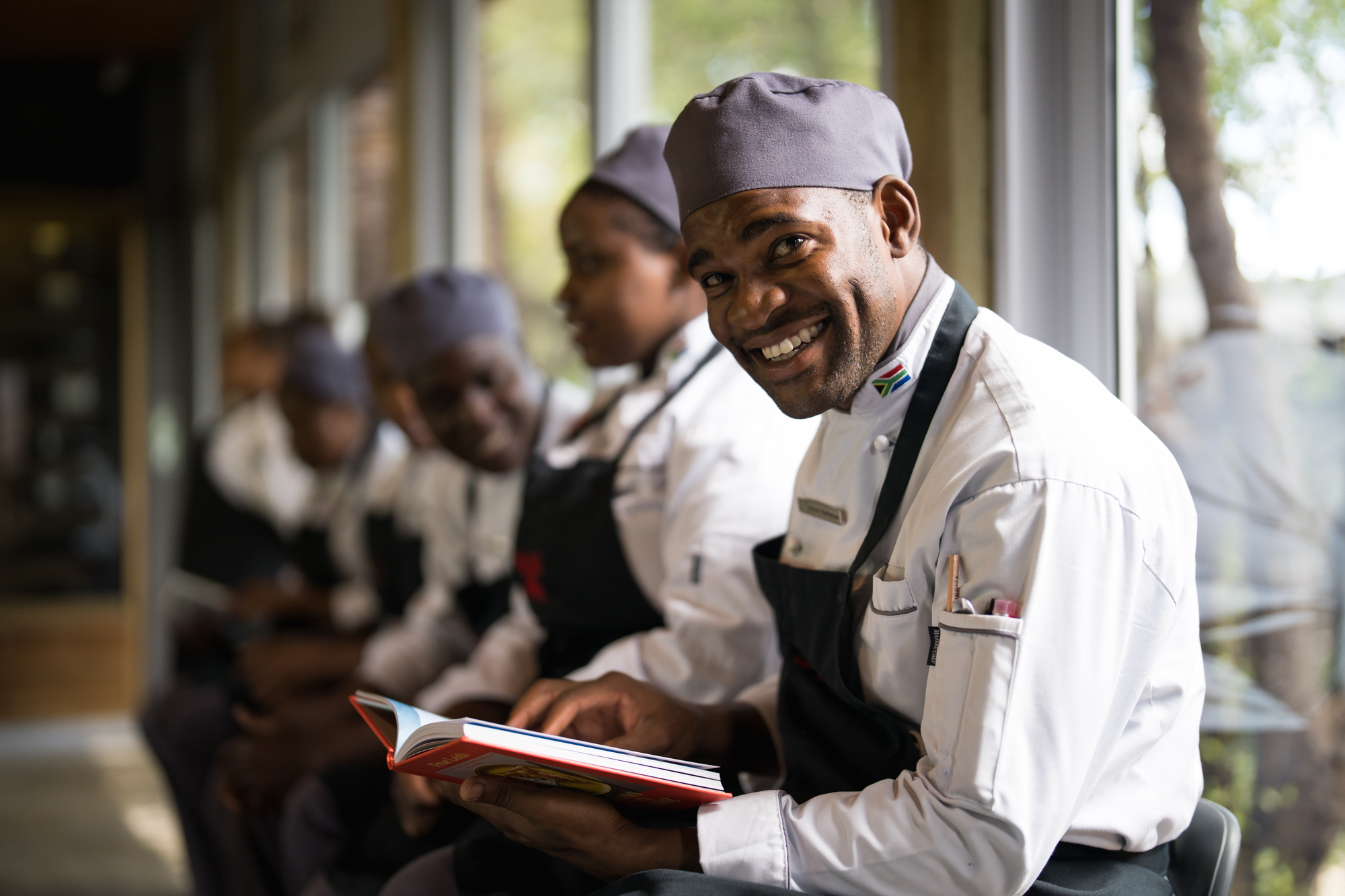 SKNP COMMUNITY SCCS Dame Prue Leith Student Osborne Mathabule Reading Dame Prue Leith Cookbook Ross Couper 2