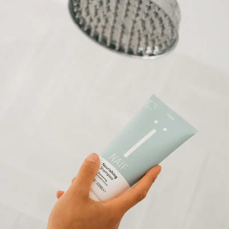 Verzorgende Shampoo onder douche
