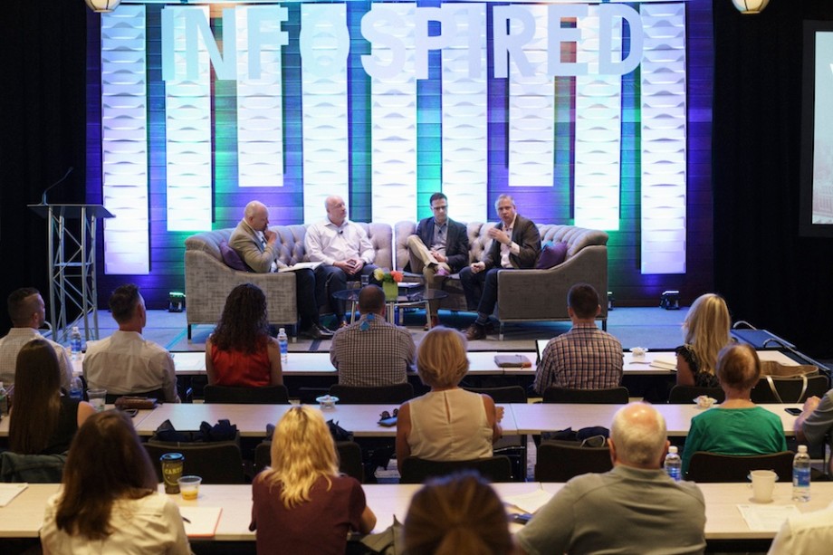 Security panel sits under info spired sign on partner summit stage