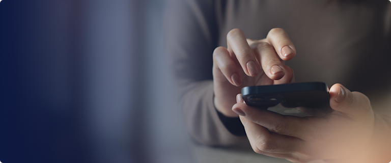 Close up of hands on device