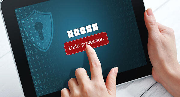 Person tapping Data Protection button on iPad