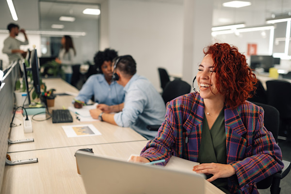 Smiling woman with headset
