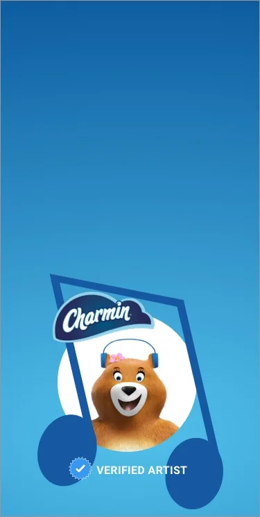 Molly the Charmin Bear wearing headphones and smiling