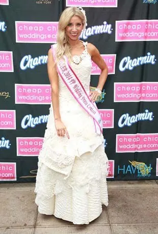 Woman posing in 2014 winning Charmin Ultra Strong toilet paper dress