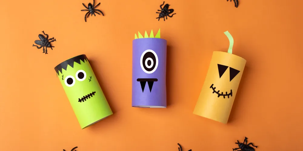 Toilet paper rolls painted and decorated as Halloween characters