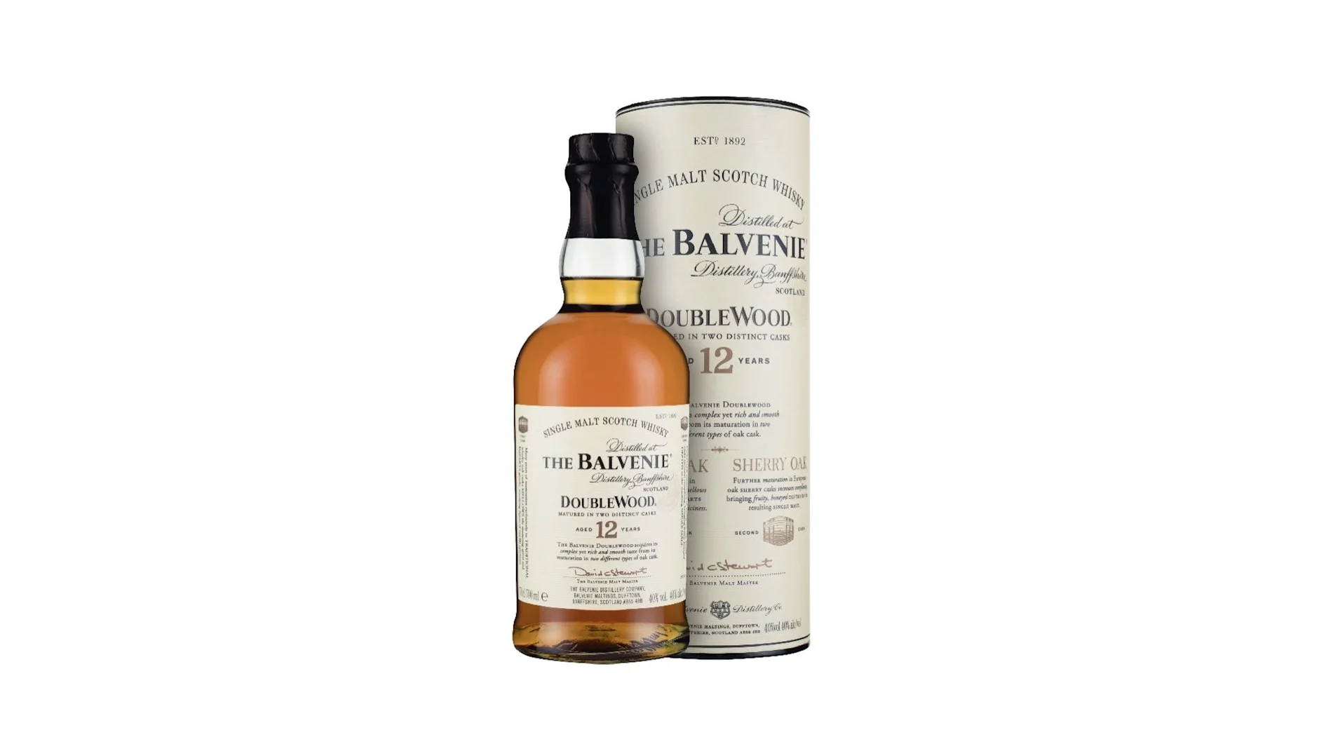 A bottle of The Balvenie DoubleWood 12-year-old single malt Scotch whisky next to its cream-colored cylindrical box with black text.