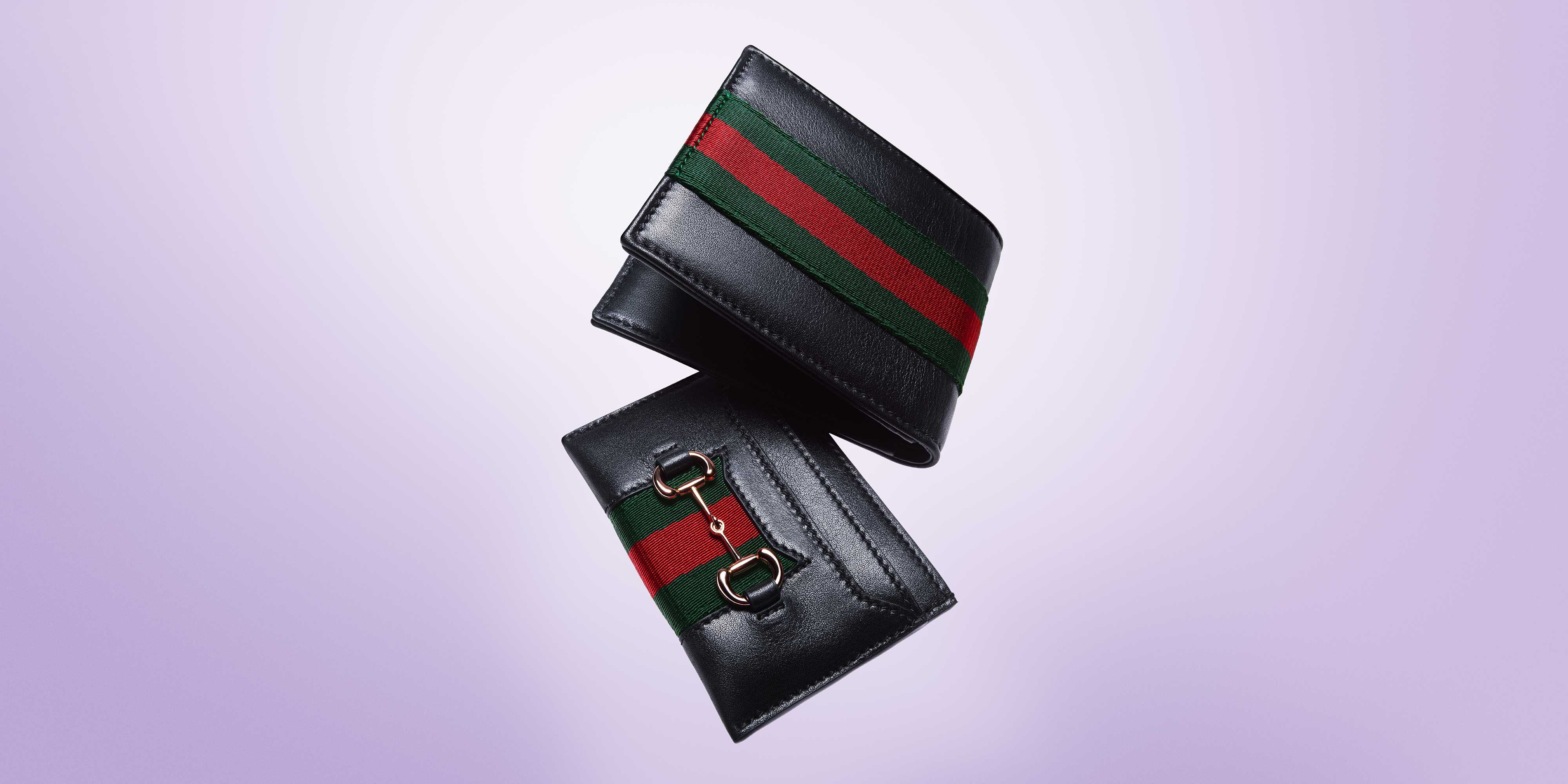 Black Gucci wallet with stripes
