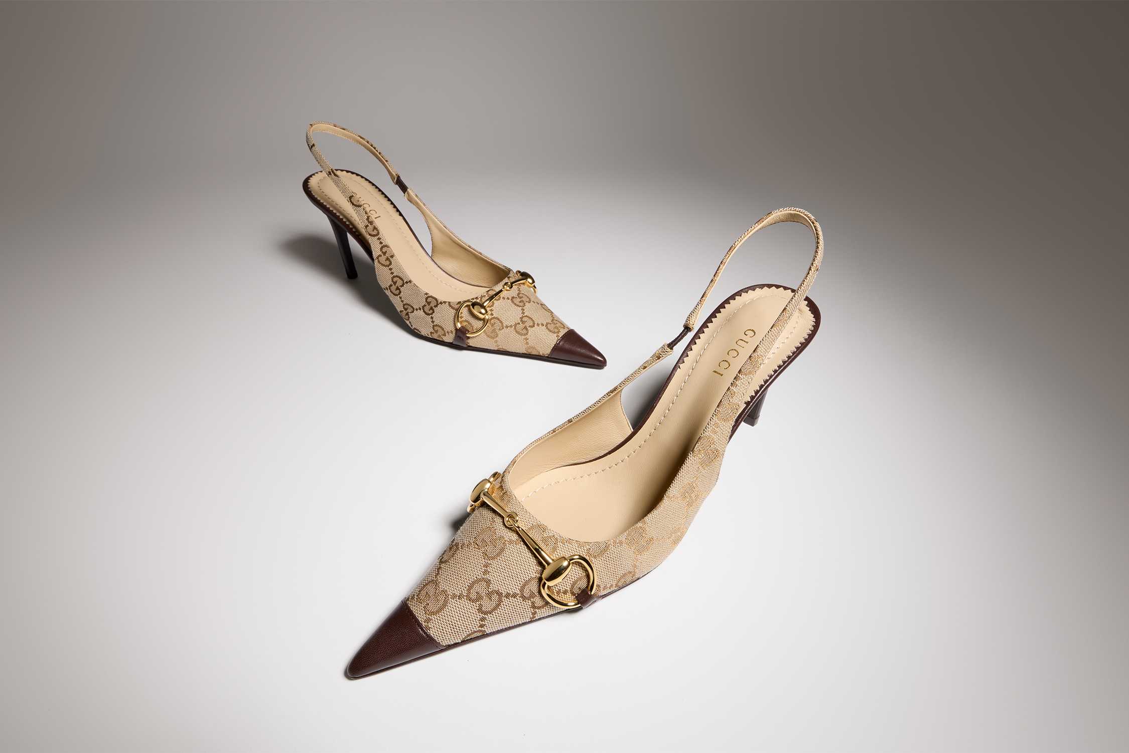 Beige Gucci monogram slingback heels