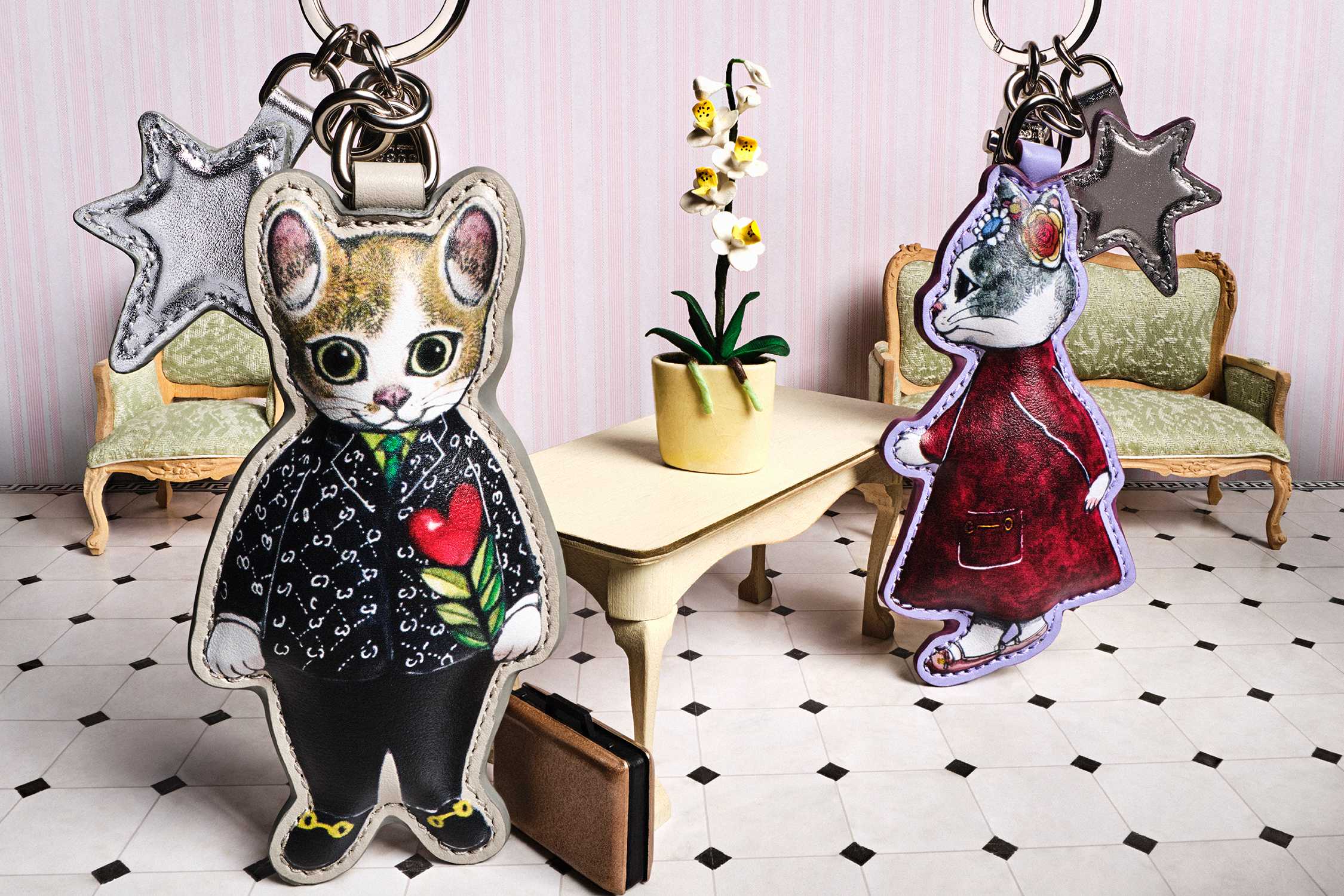 Gucci animal-themed decorative keychains displayed.