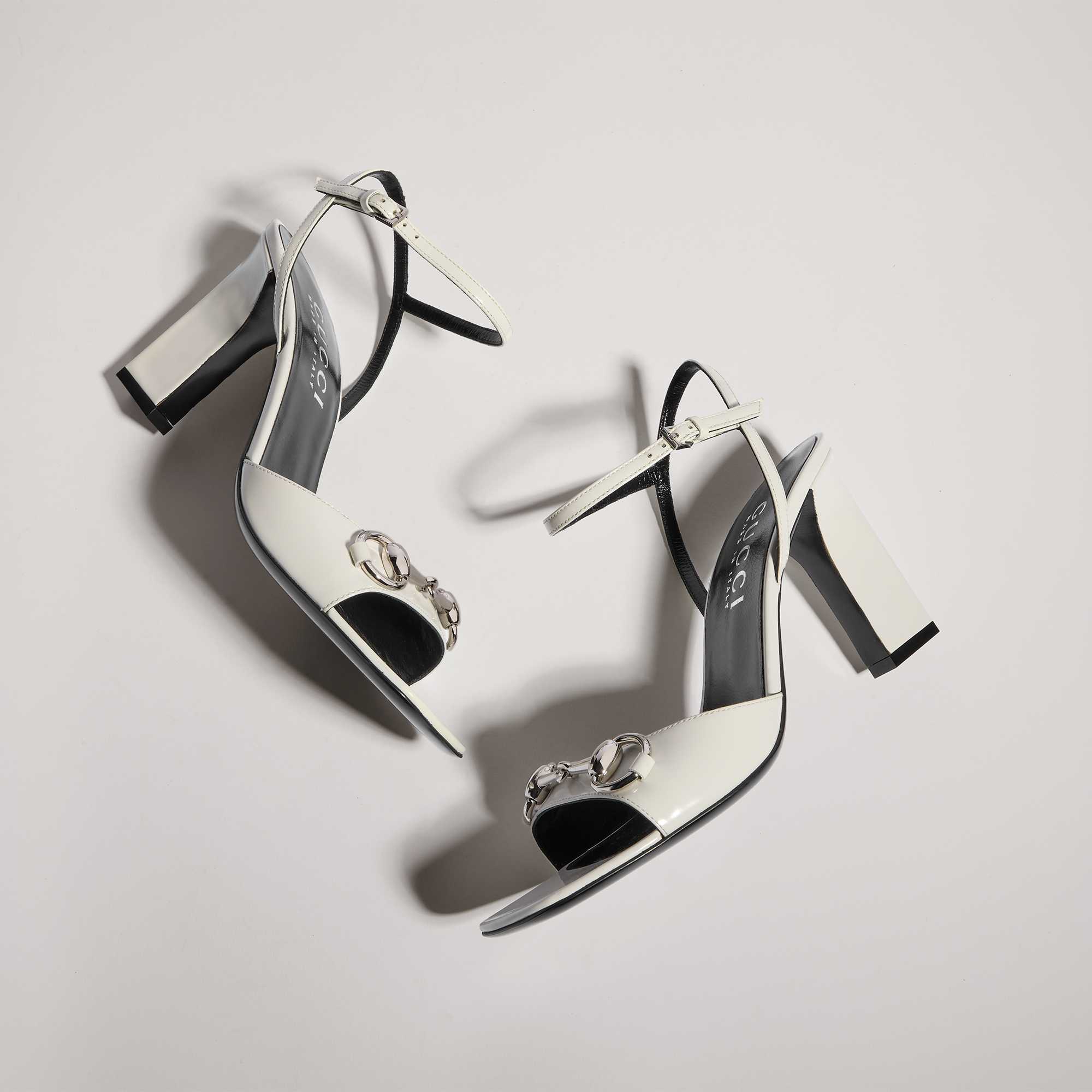 White heeled sandals with Horsebit