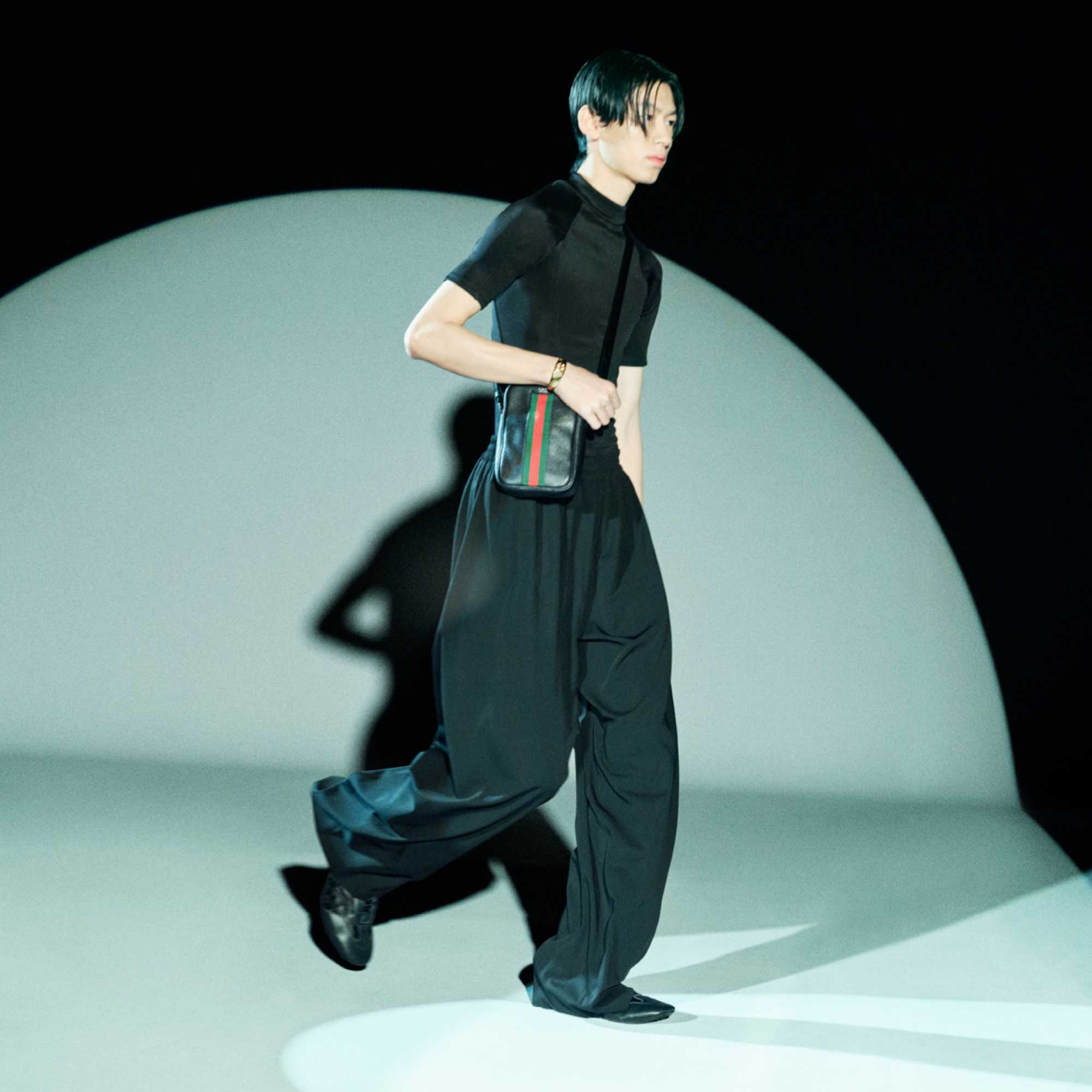 Grey suit with Gucci bag