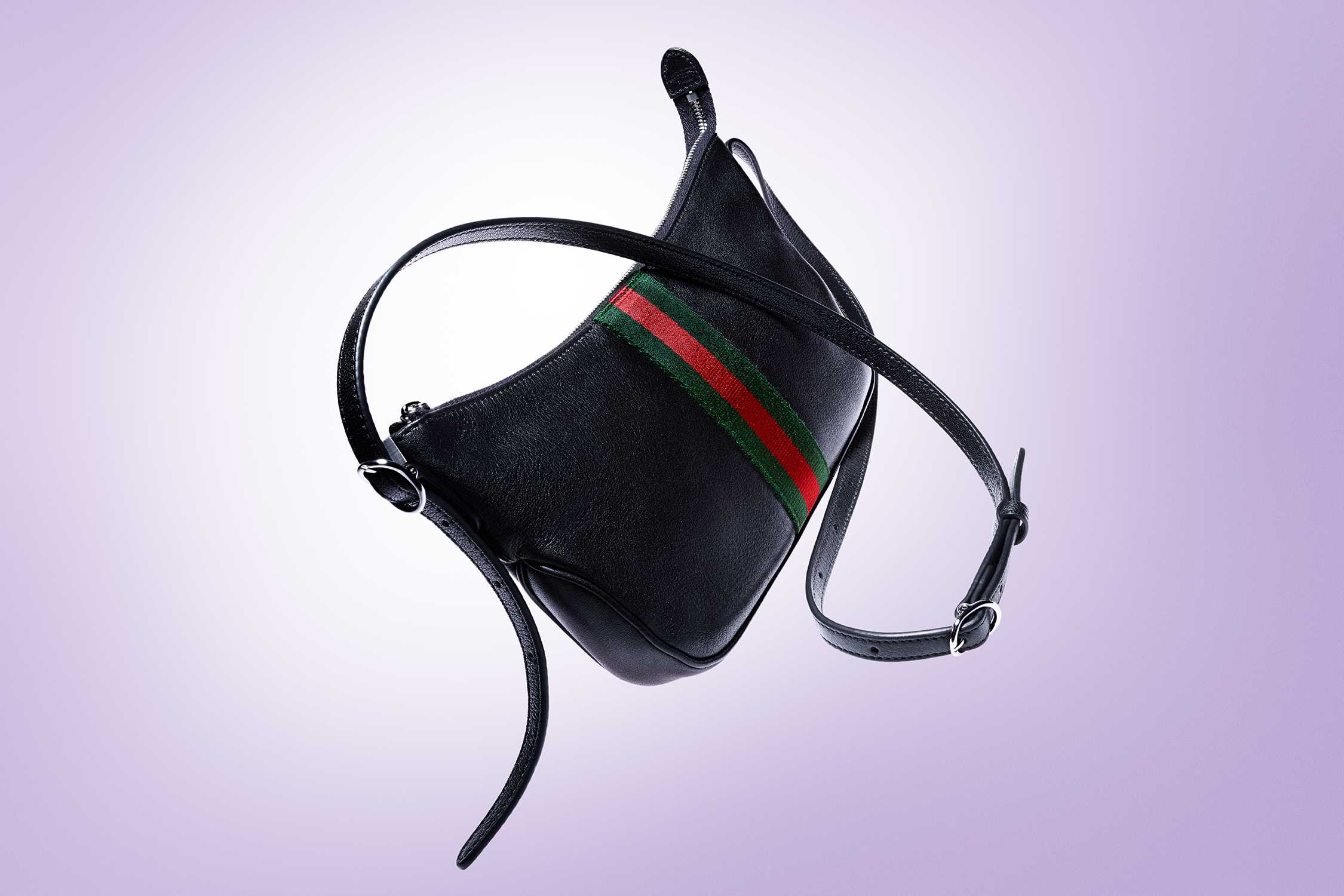 Black Gucci bag with stripes