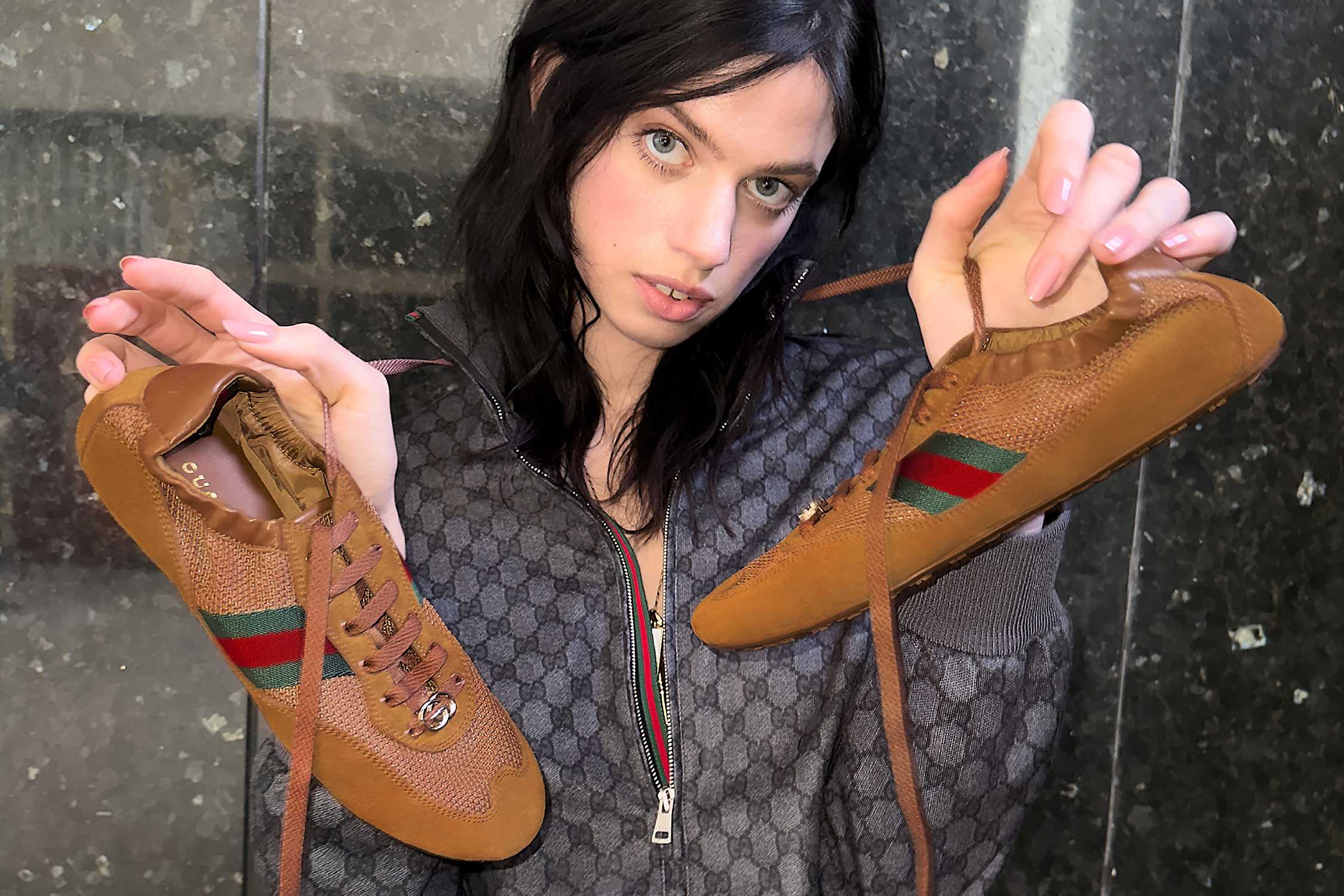 Brown Gucci sneakers with stripes