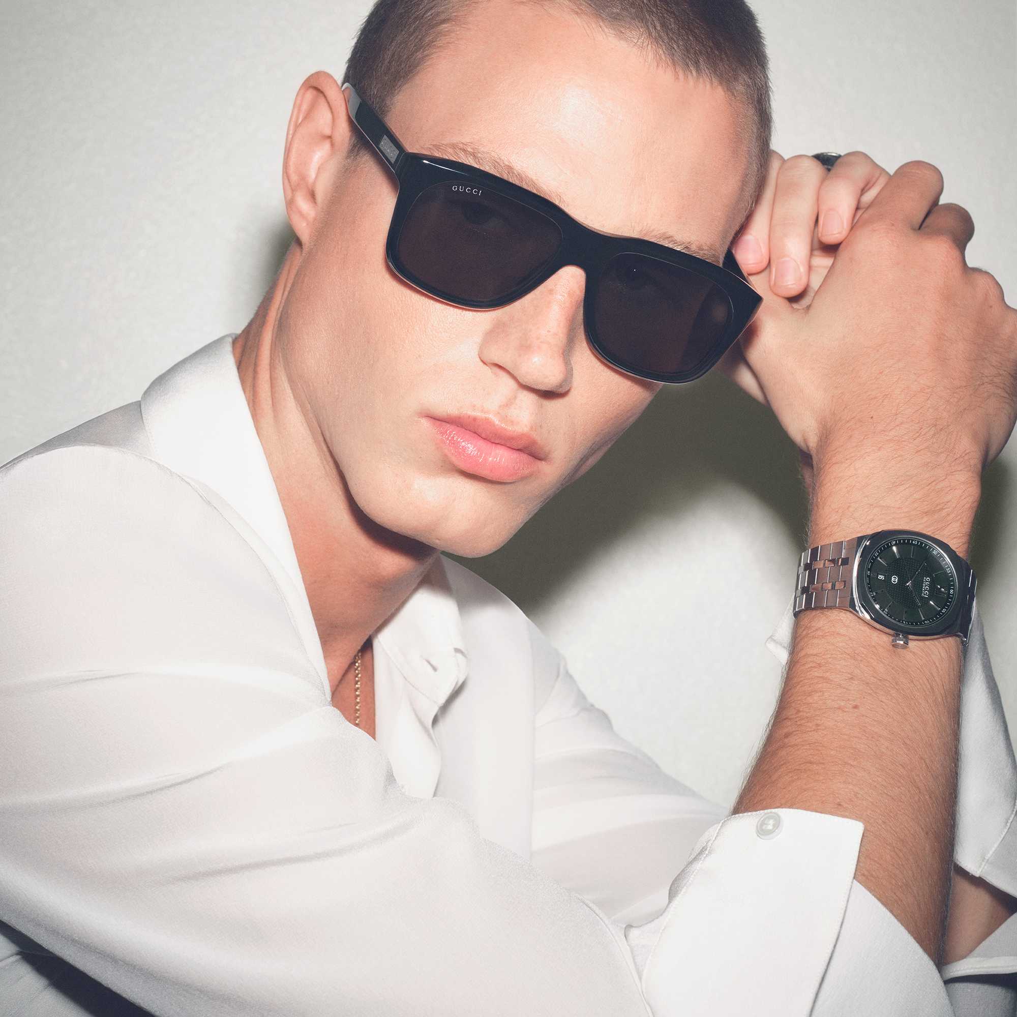 Black Gucci sunglasses red trim