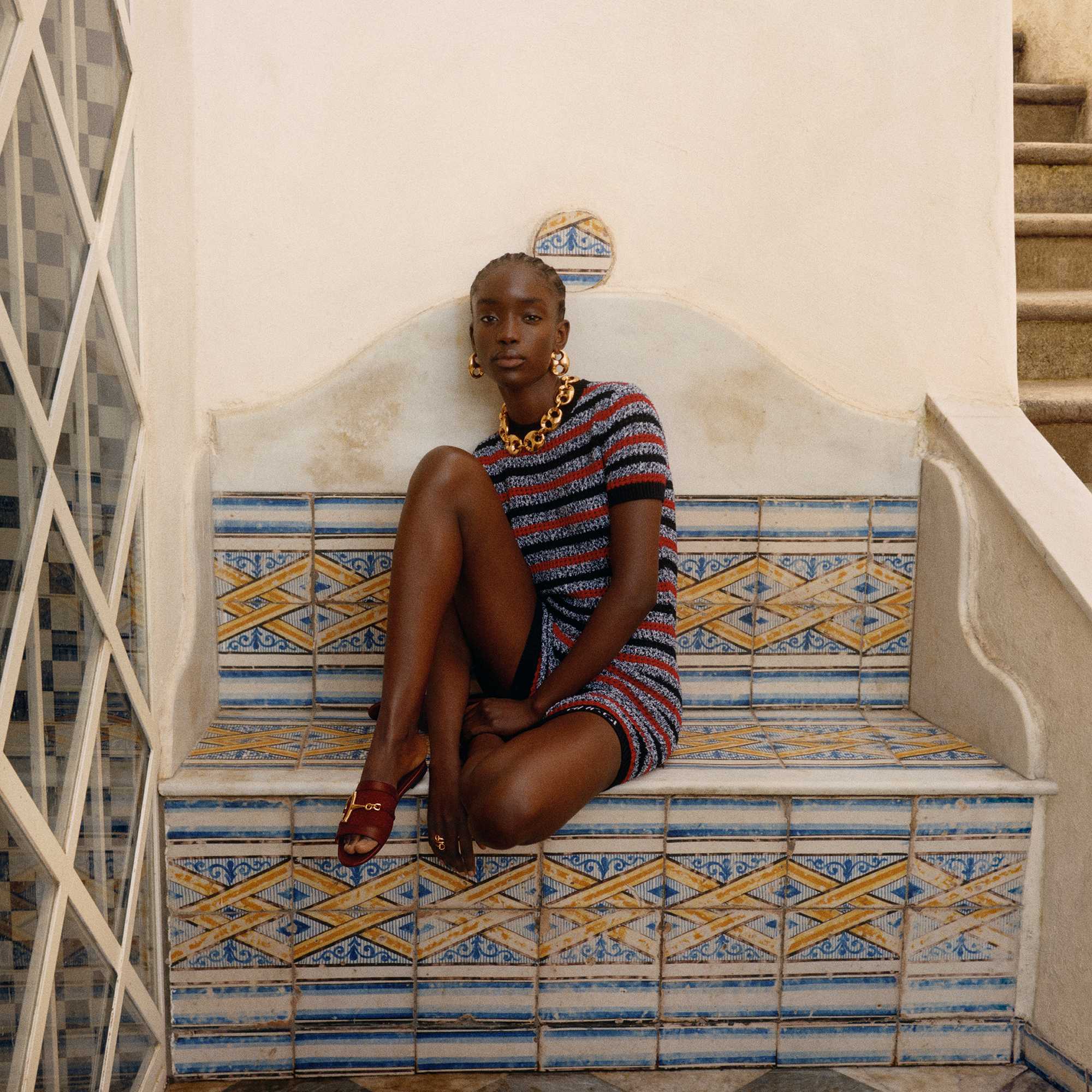 Gucci striped dress gold accessories