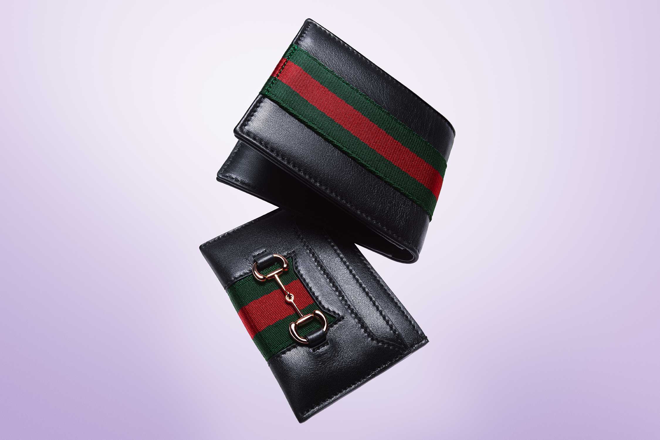 Black Gucci wallets with stripes