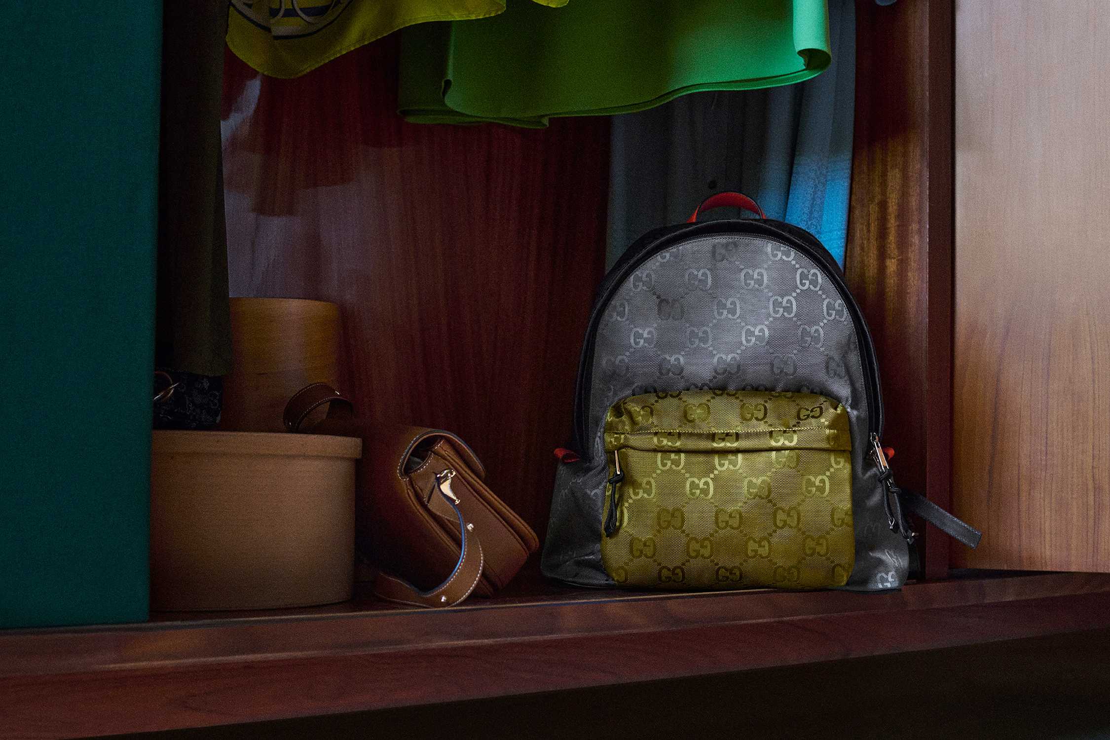 Grey-yellow Gucci monogram backpack