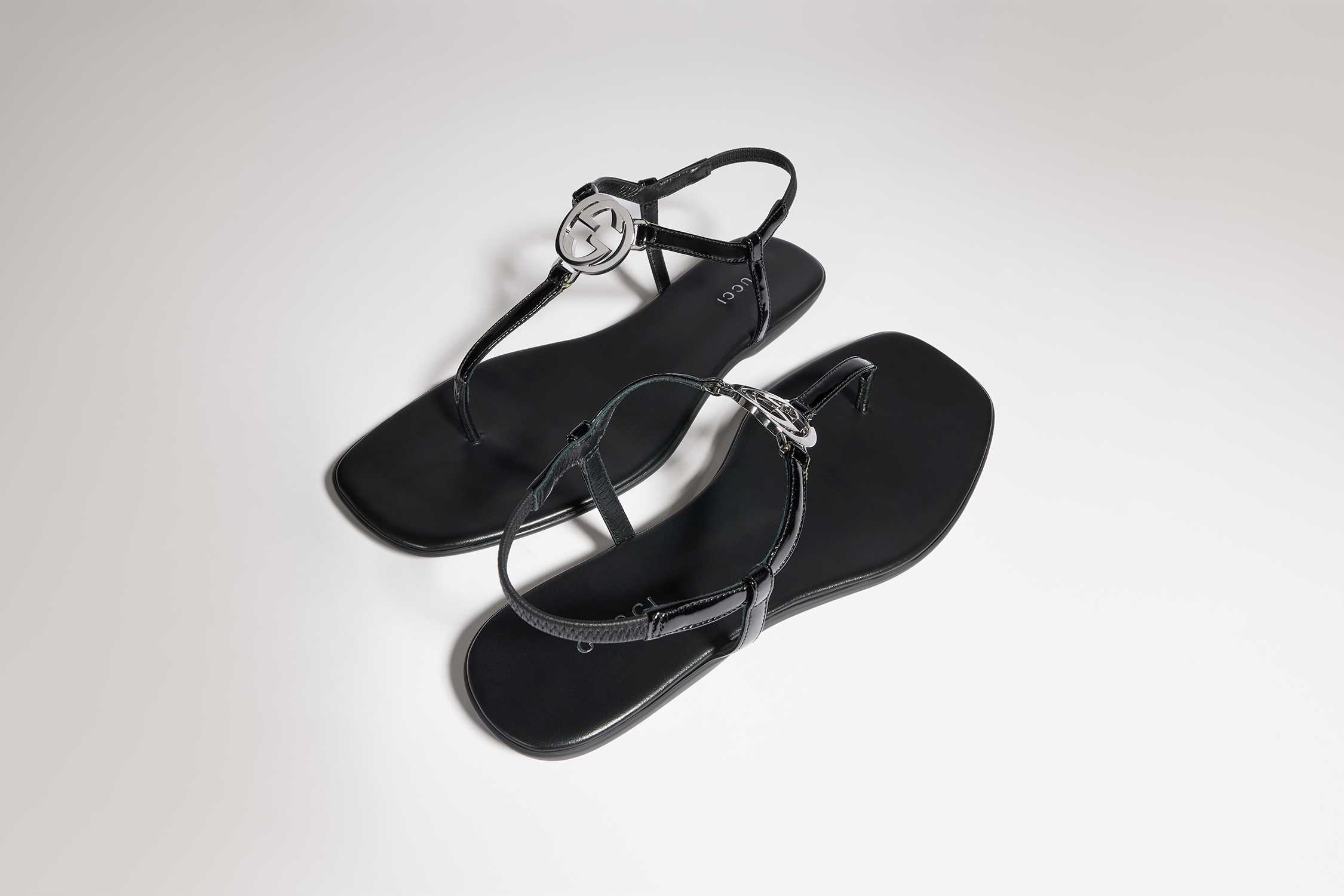 Black Gucci flat thong sandals