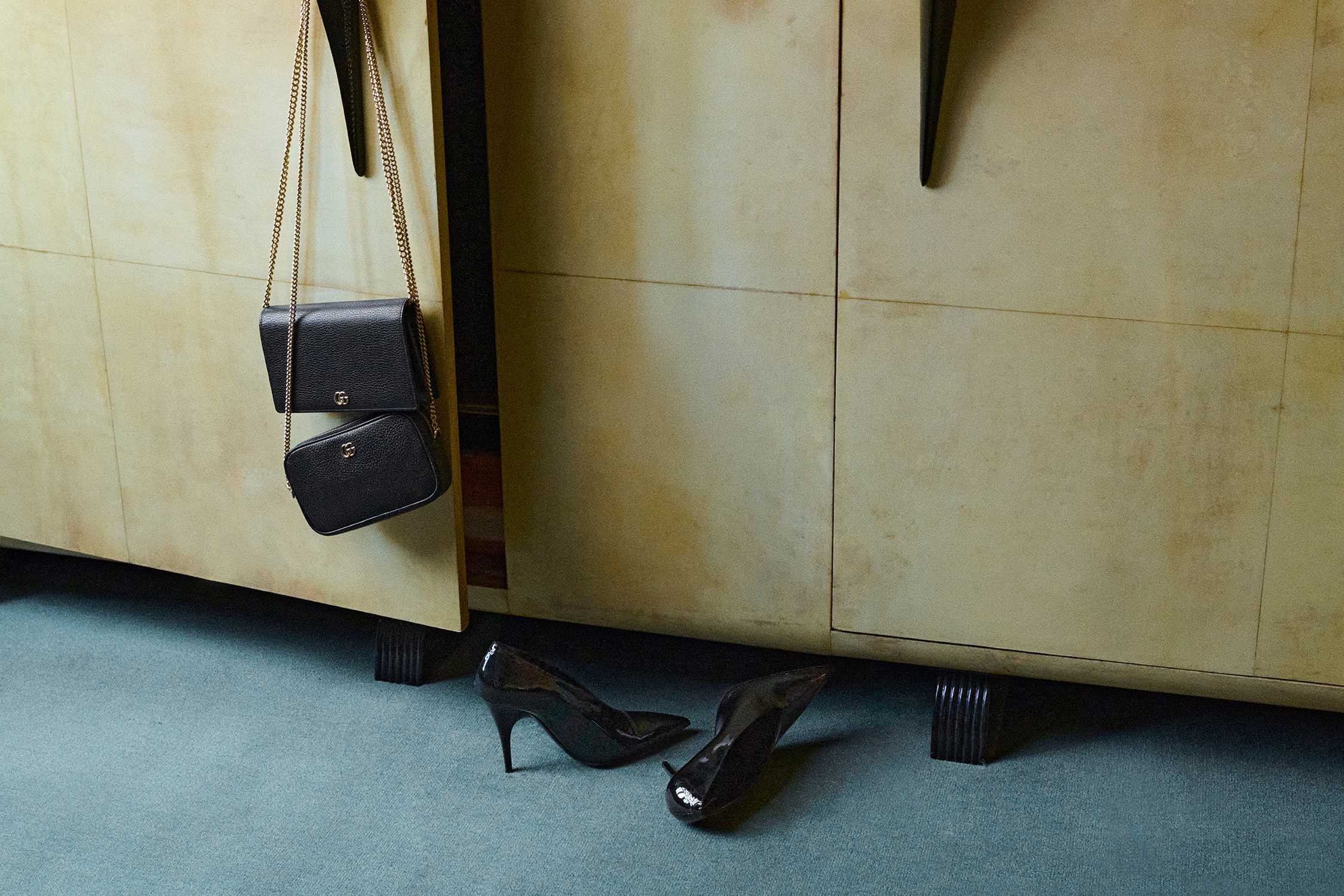 Black Gucci handbag and heels
