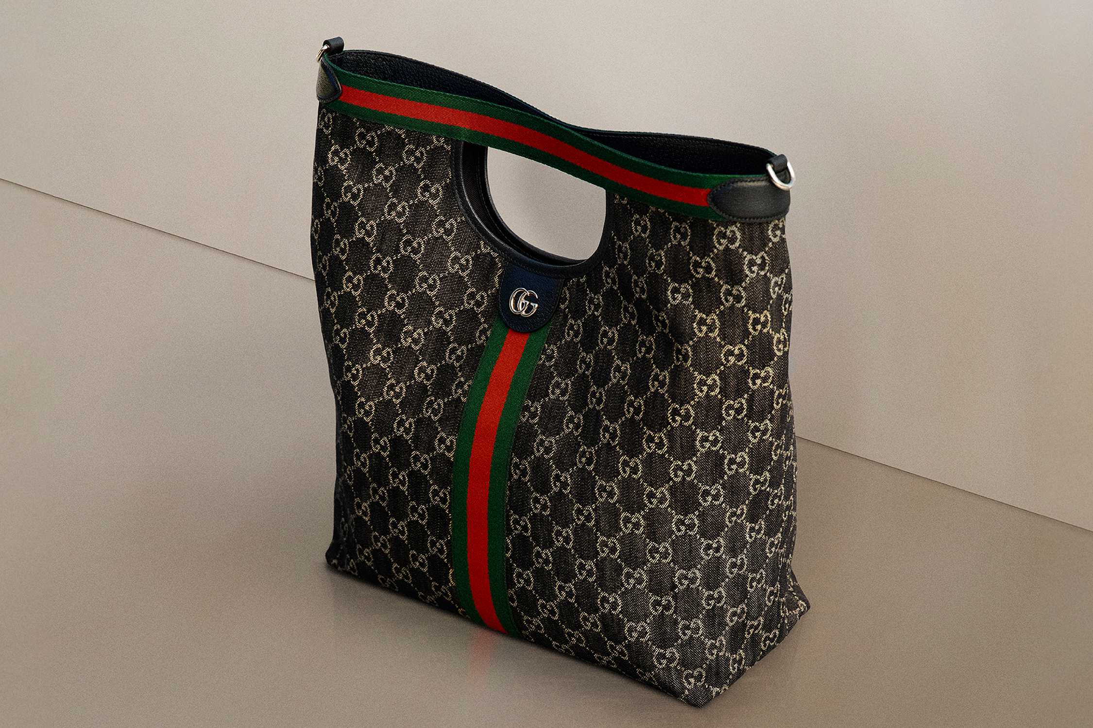 Gucci monogram bag with red-green stripe.
