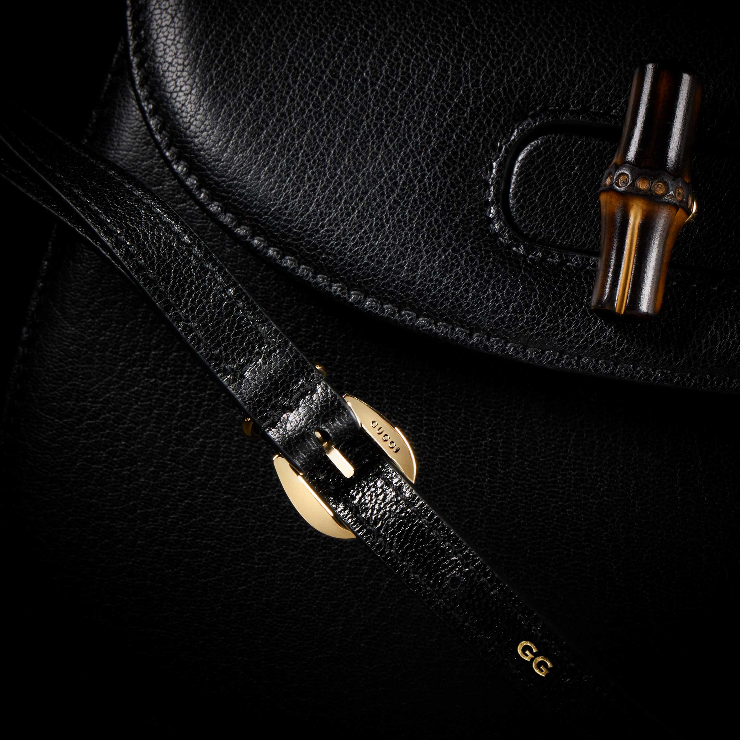 Black Gucci leather bag detail