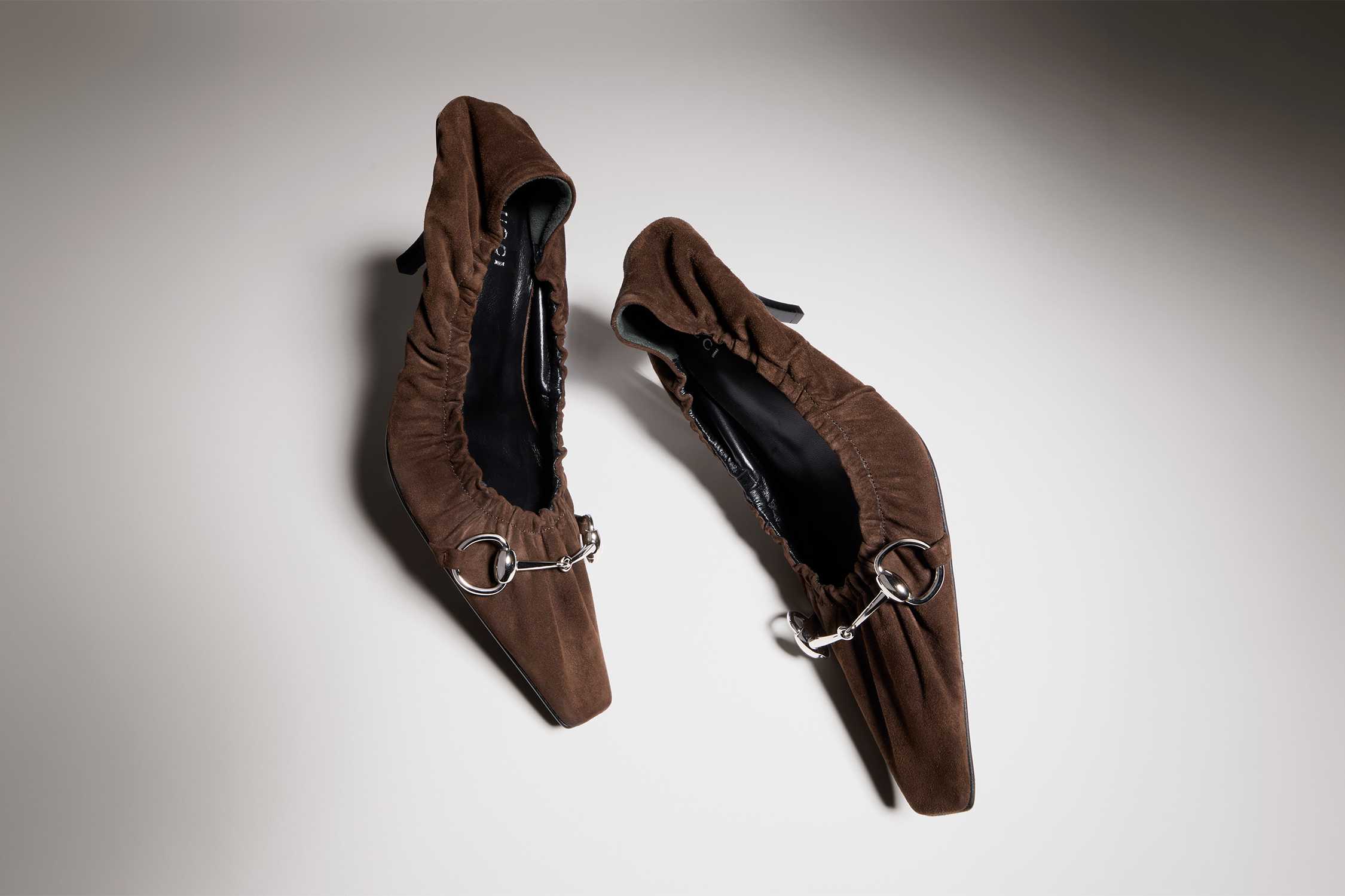 Brown Gucci suede horsebit heels