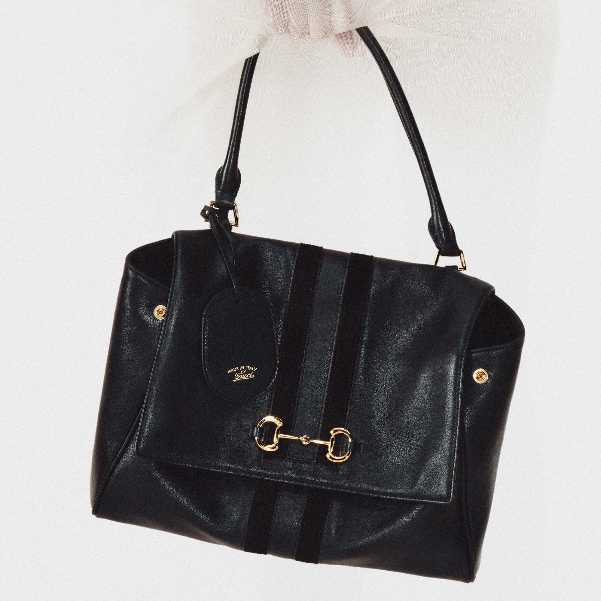 Black Gucci leather horsebit bag