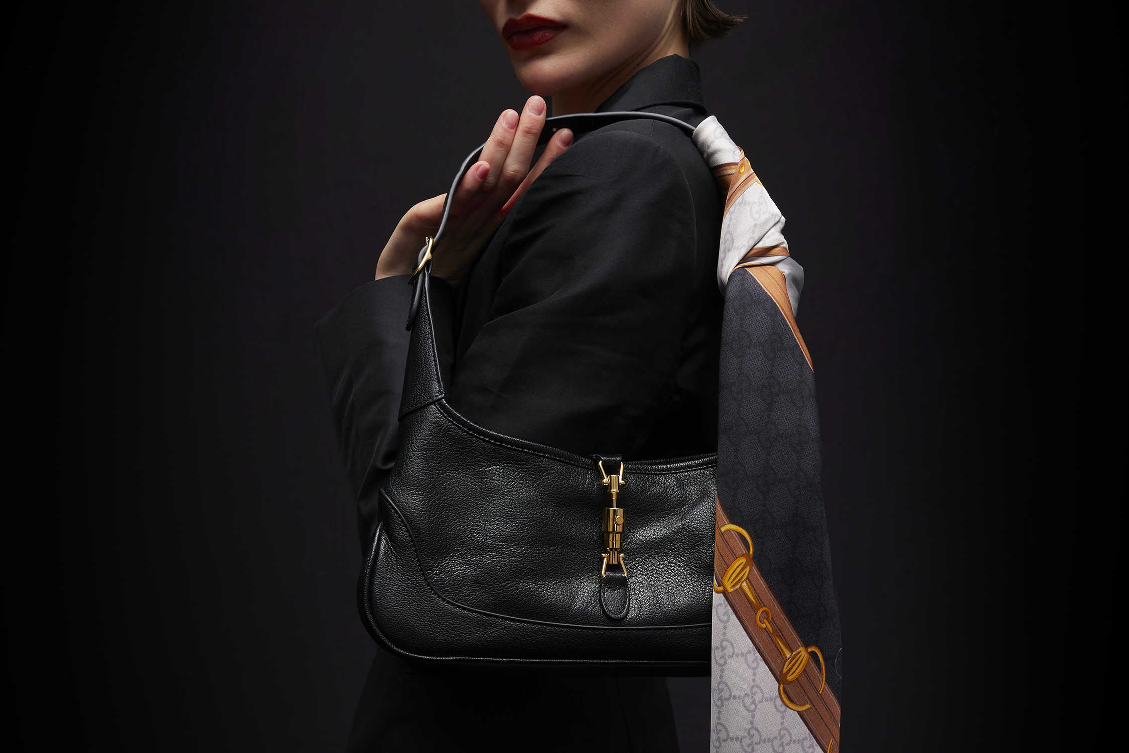 Black Gucci Jackie bag gold hardware