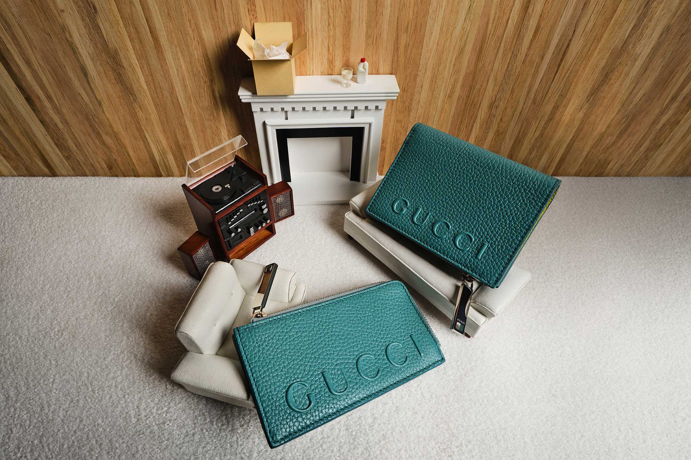 Teal Gucci leather card holders