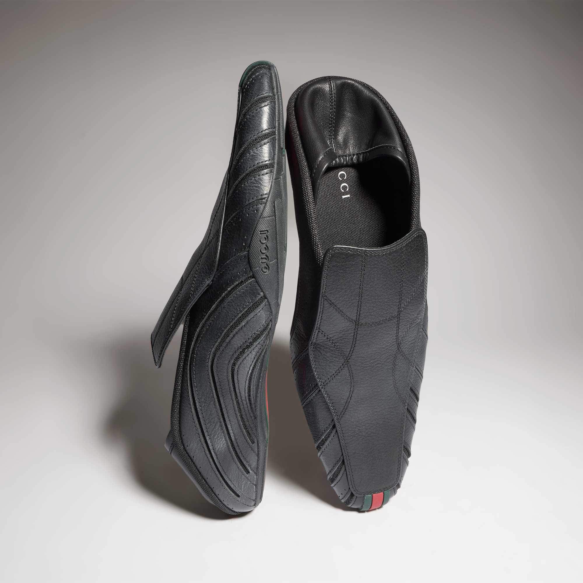 Black Gucci leather loafers pair