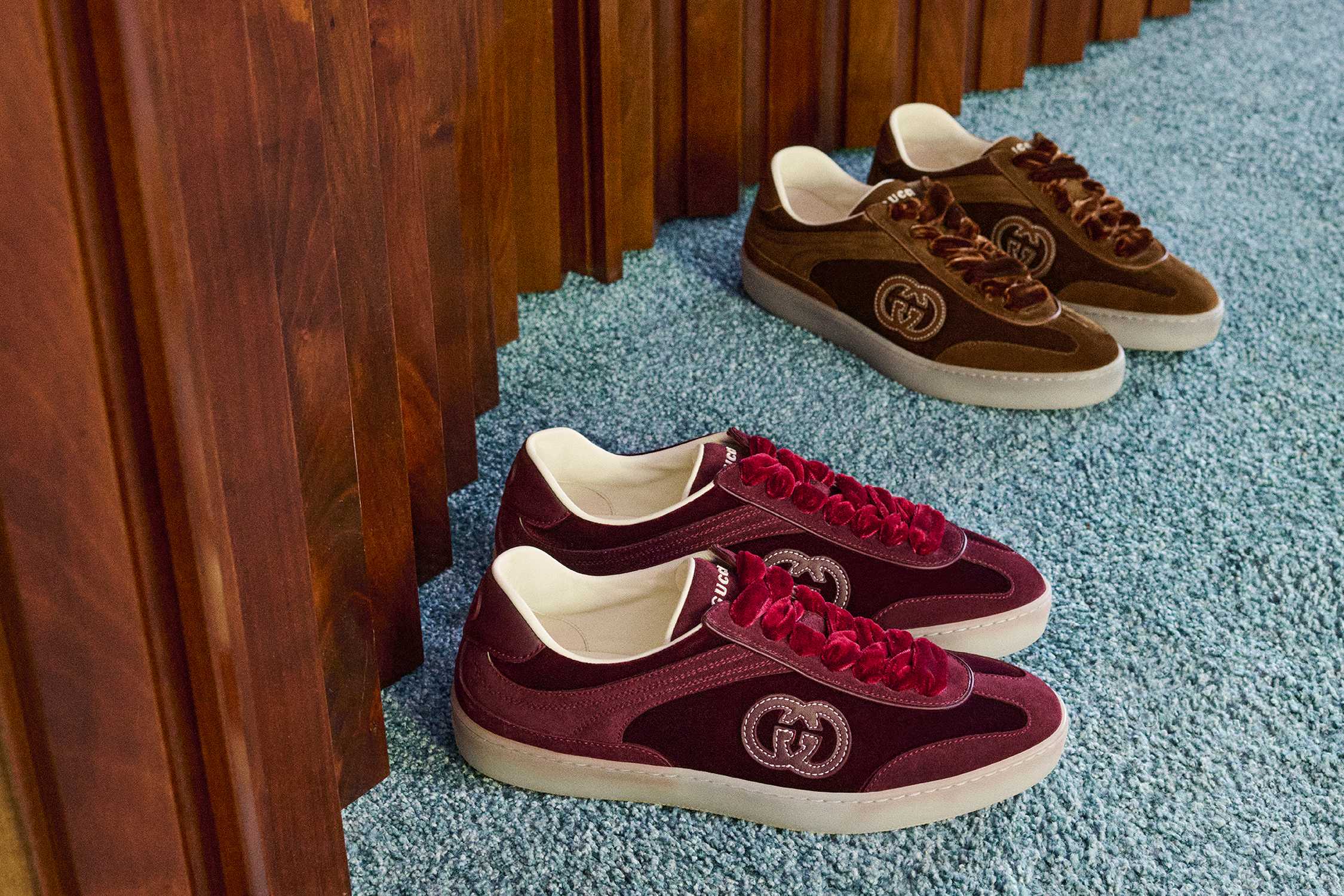 Gucci brown and burgundy trainers.