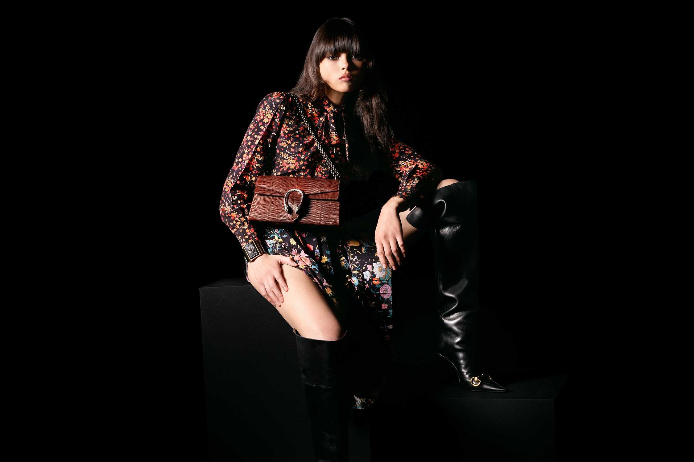 Brown Gucci bag, floral dress