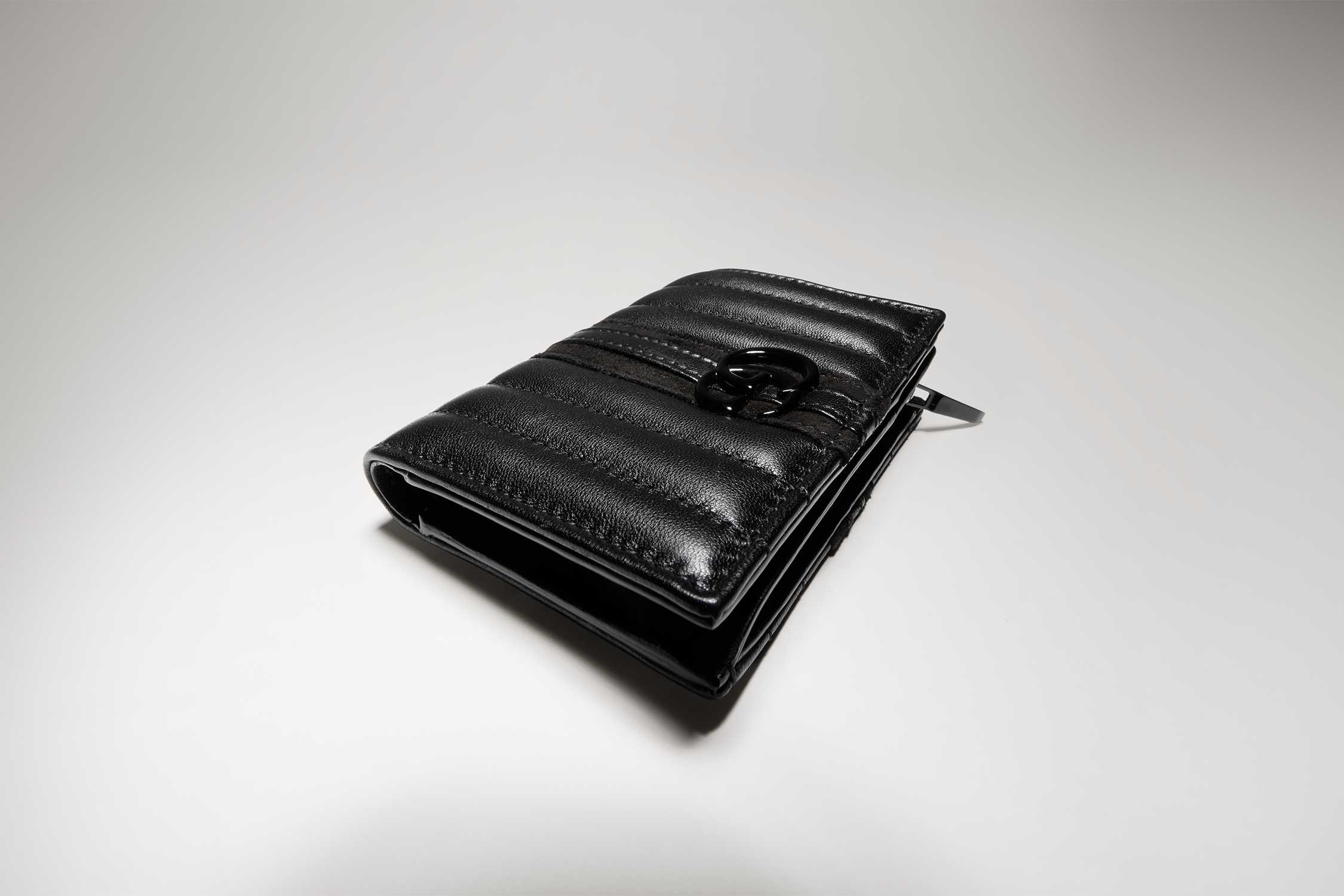 Black Gucci quilted leather wallet