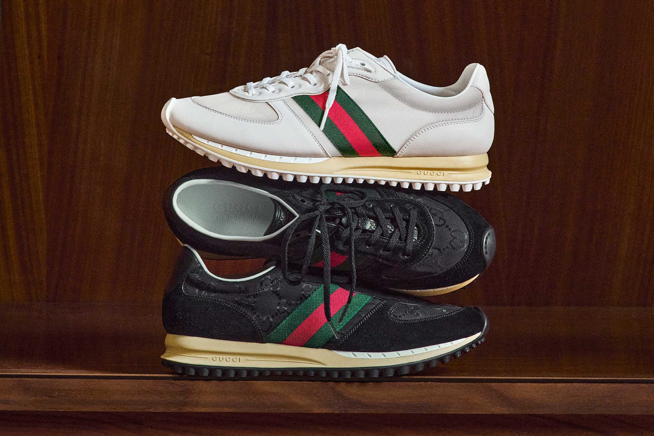 White and black Gucci trainers.